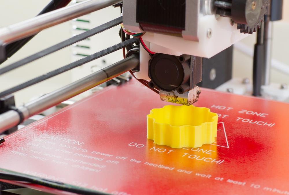 Photopolymer is used in 3D printing to deposit layers of material.