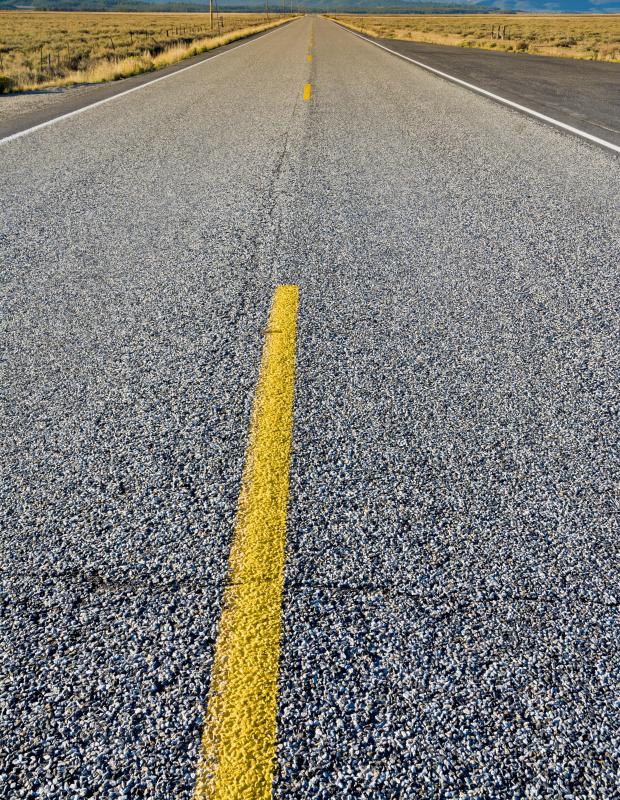 Some people found work under the New Deal paving roads.