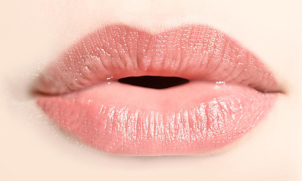 Lip gloss is used to give lips a shiny appearance.