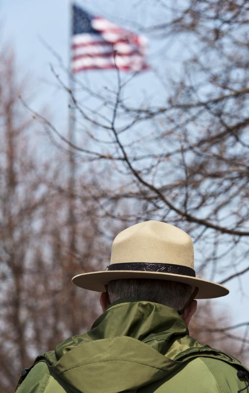 Park rangers maintain parks and also provide law enforcement.