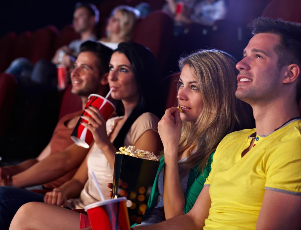 Movie trailers are shown in theaters before the feature presentation.