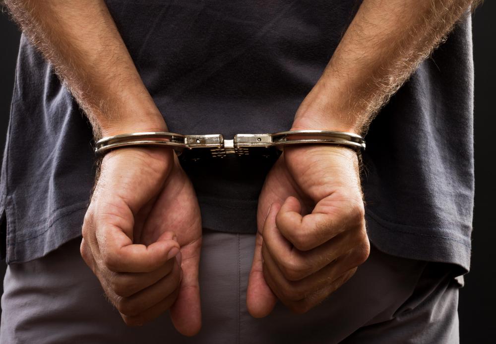 Handcuffs are designed to lock an individual's hands together.
