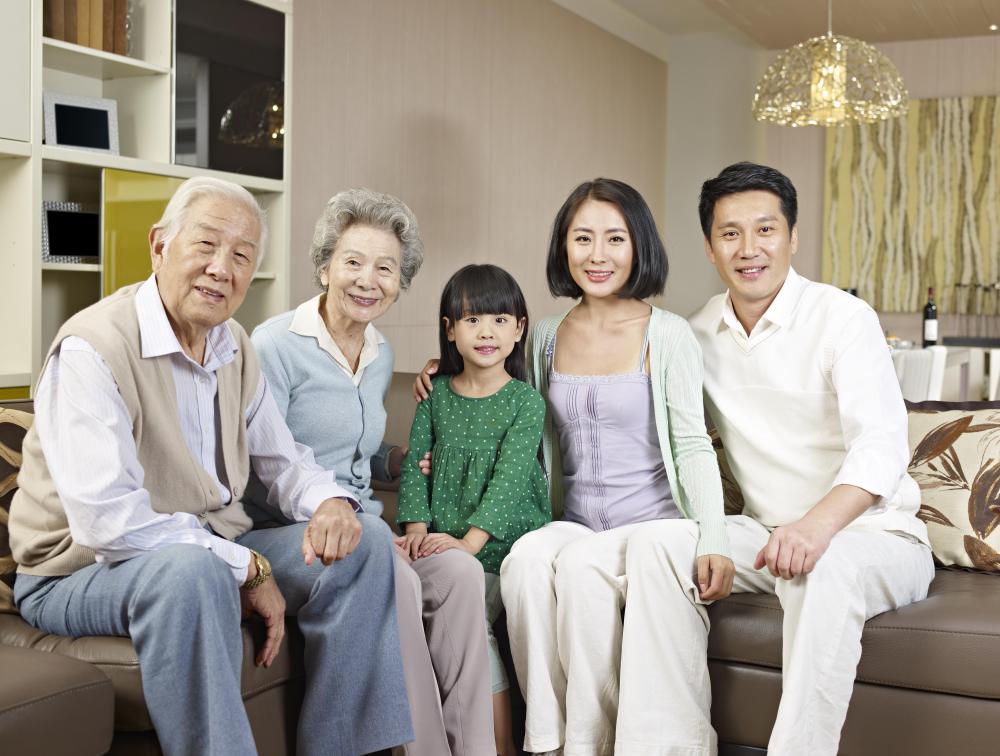 Family photos can be framed to create a wall hanging.