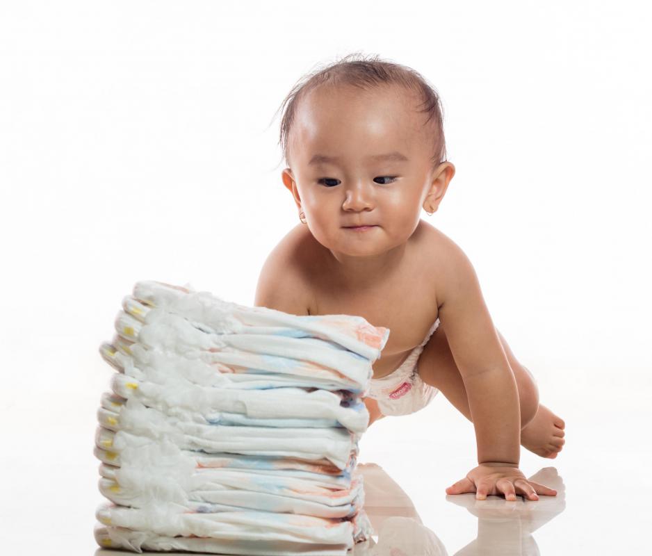 A diaper cake is a practical gift for a baby shower.