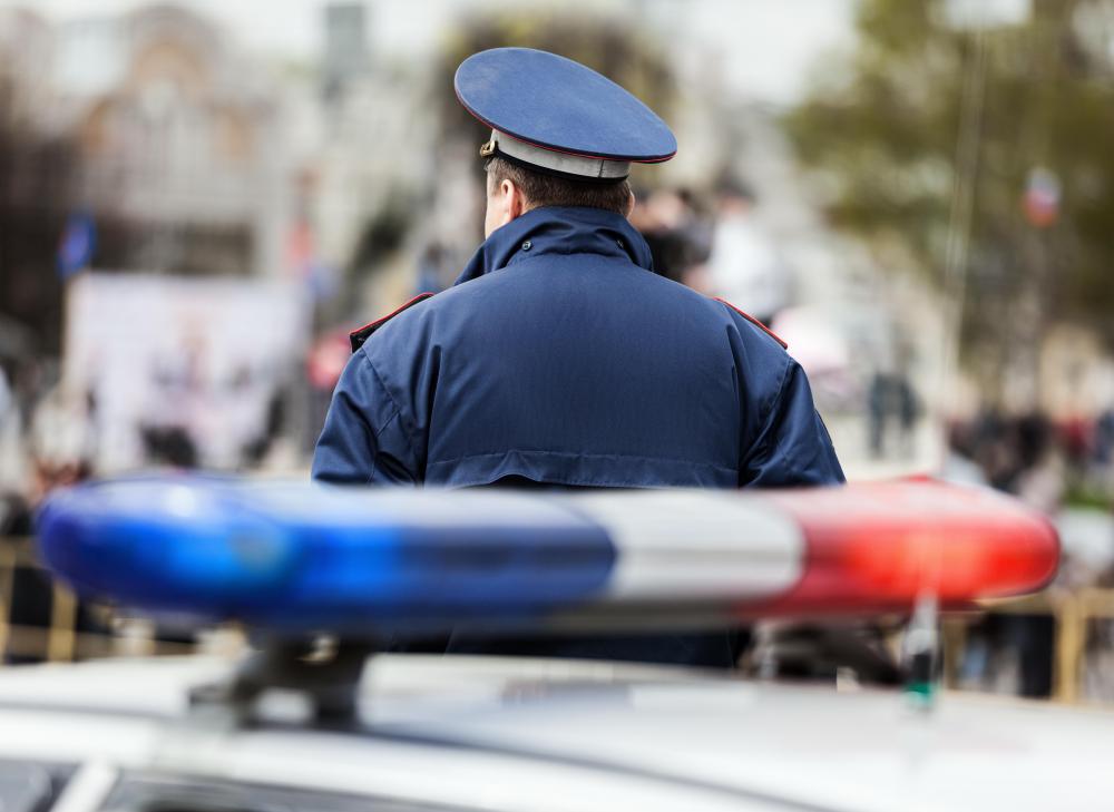 Police officers might patrol areas looking for criminal suspects.