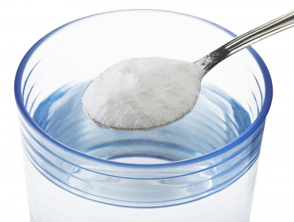 Pouring vinegar down a drain, and then baking soda, can remove calcium deposits.