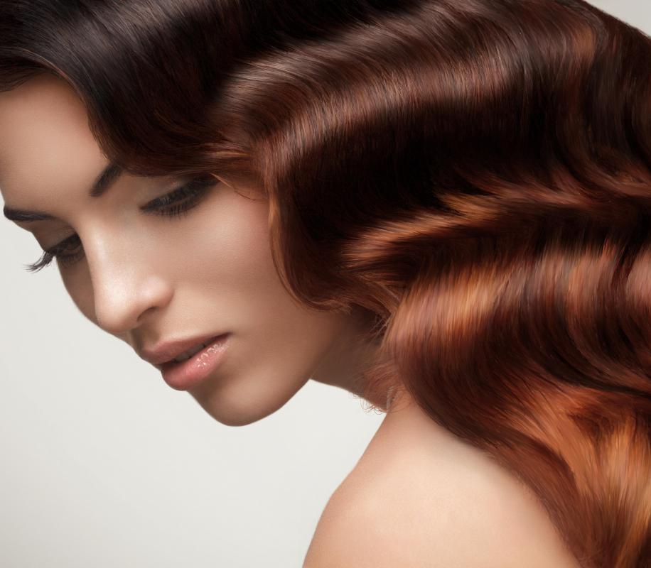 Brunettes may use hair toner to draw out auburn shades.