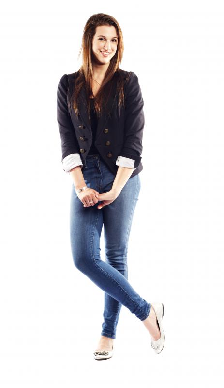 Skinny jeans can cause a tingling thigh by compressing the lateral femoral cutaneous nerve.