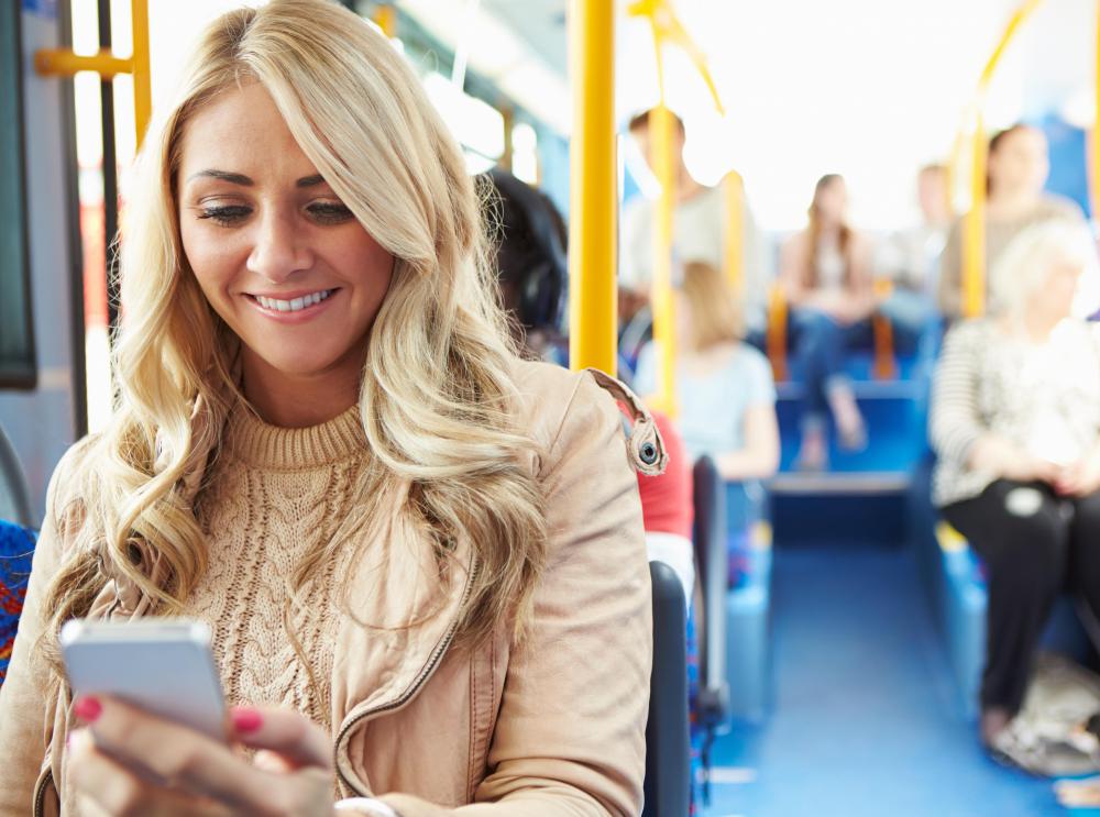 While dangerous when driving, using public transportation allows for such activities as texting.