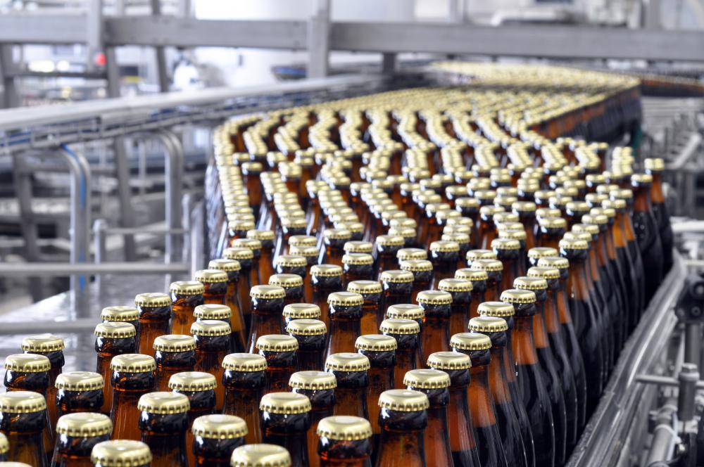Conveyor systems are used to move a large quantity of goods across an area, like the conveyor belts in a bottling plant.