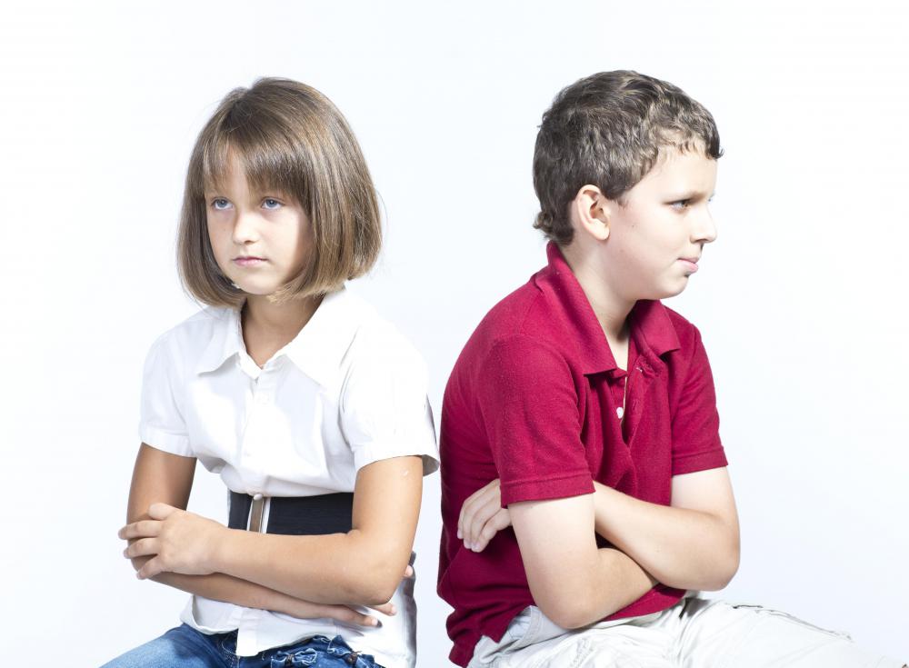 Symptoms of high level autism include a serious and uncommunicative demeanor.