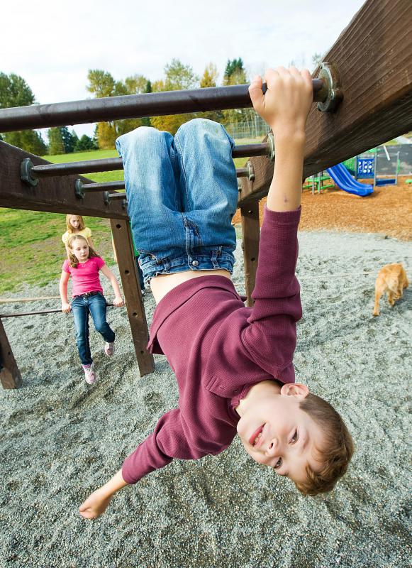 Sand and other loose fill materials may be used as a playground surface.