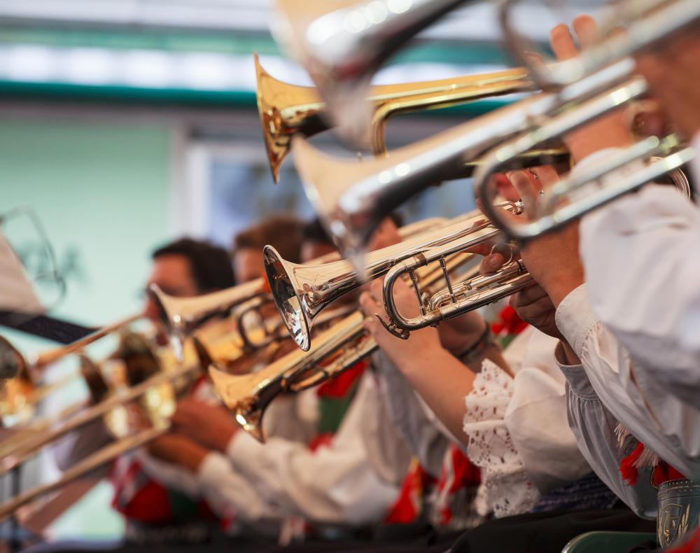 Brass instruments are made out of metal and do not require a reed.