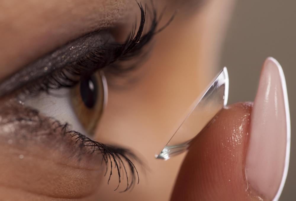 Some contact lenses use pressure to reshape the cornea.