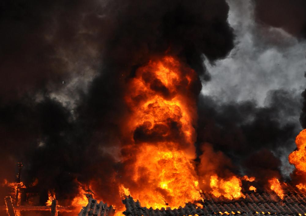 Disaster management includes trying to contain a fire before it spreads.