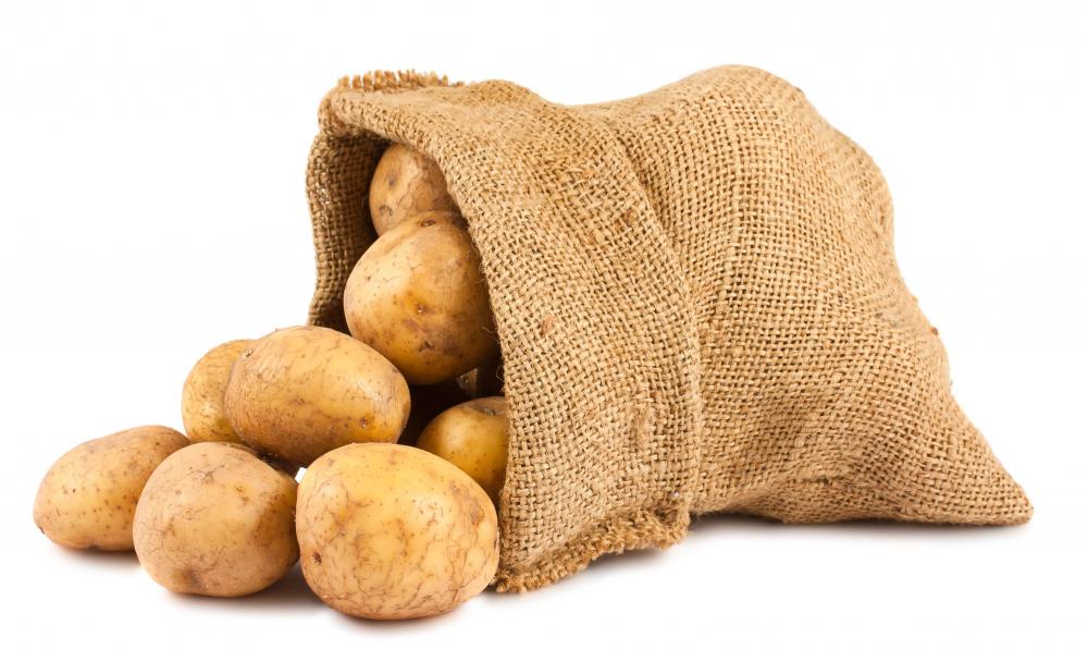 Burlap bag with potatoes.