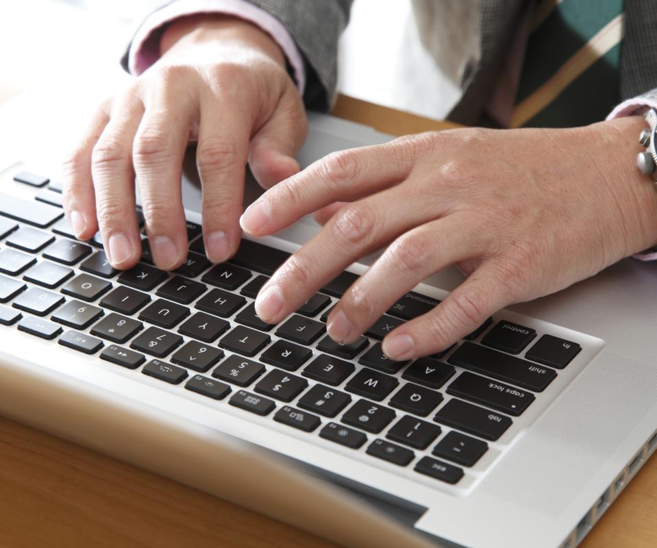 A MacBook laptop keyboard has multimedia keys built-in.