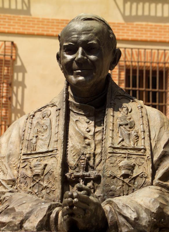 Pope John Paul II's visit to the Philippines helped prompt Ferdinand Marcos to lift martial law.