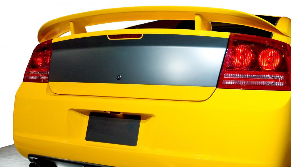 Spoilers provide a car with downward force.