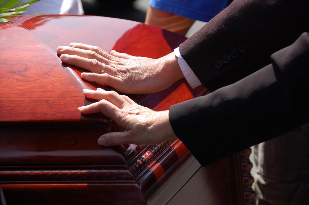 People often cry when they've suffered a loss, such as at a funeral.