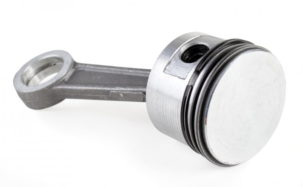 Cast aluminum is often used to make automobile parts, like engine pistons, because it is heat resistant and lightweight.