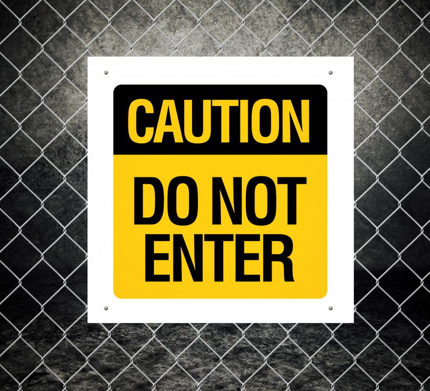Failure to post warning signs that results in injury is a neglect of duty omission.