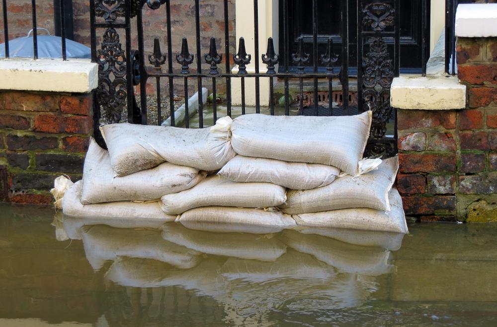 Sandbags might be used to build temporary check dams during flooding.
