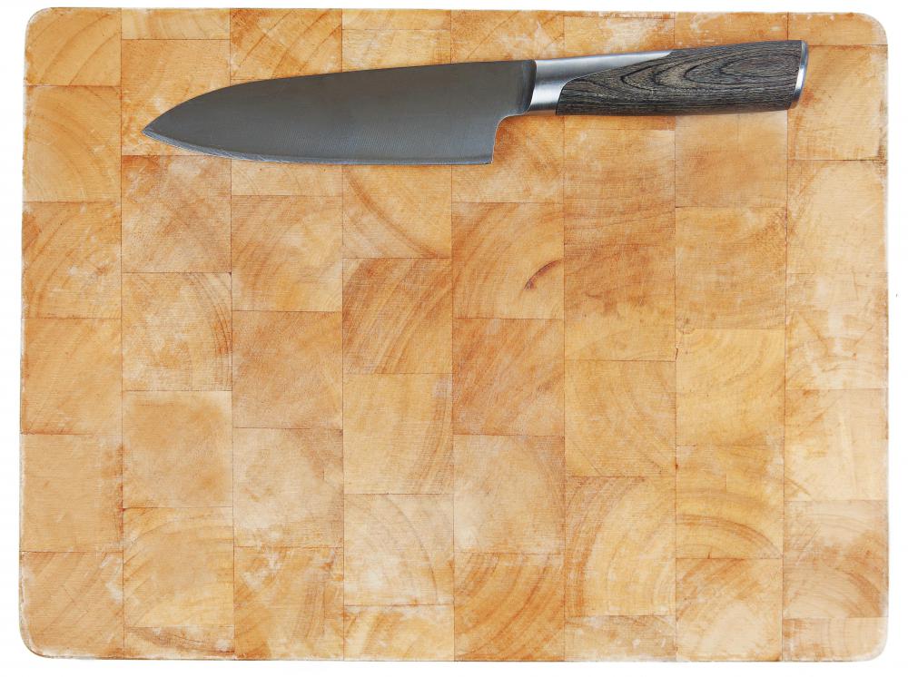 Cutting boards should not be made of pressure treated wood.