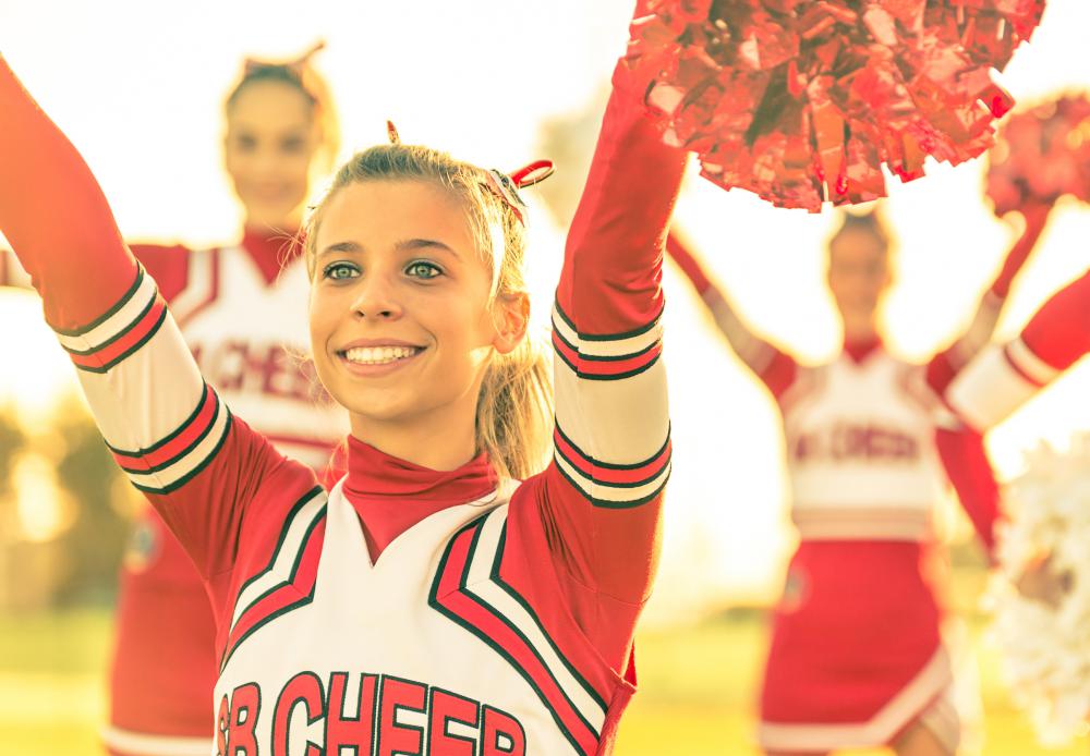 Cheerleaders perform highly athletic movements that can lead to knee strain.