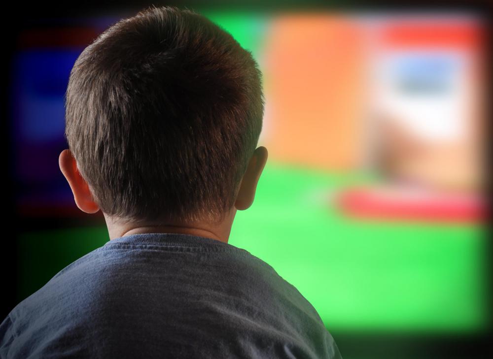A voice over artist may provide narration over visual elements during a television commercial.
