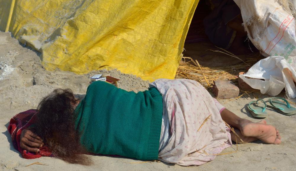 Refugees are sometimes housed in temporary encampments.