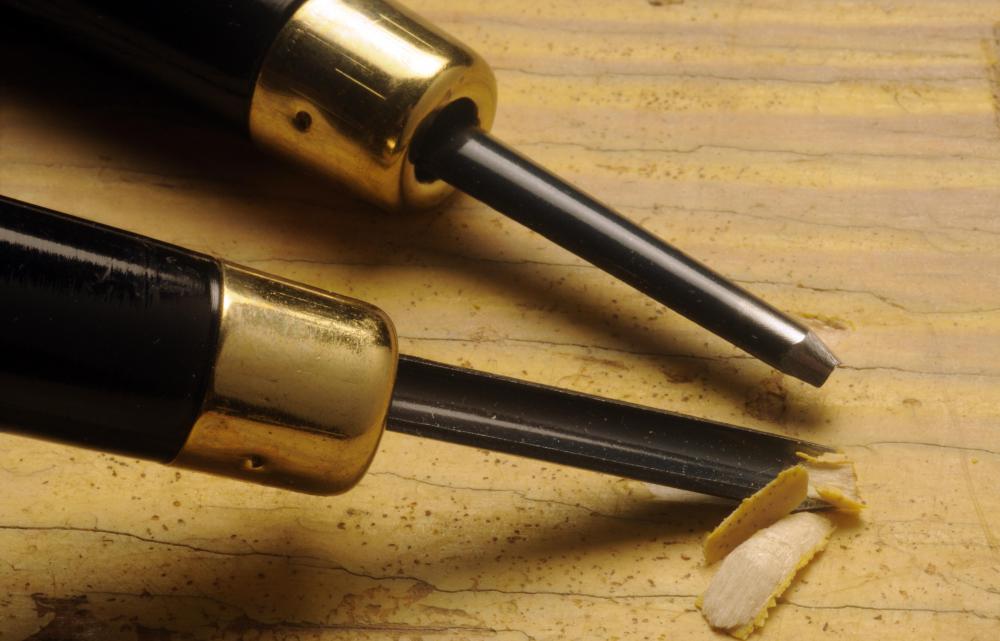 There are many types of chisels, including those with fine blades for etching fine details into wood.