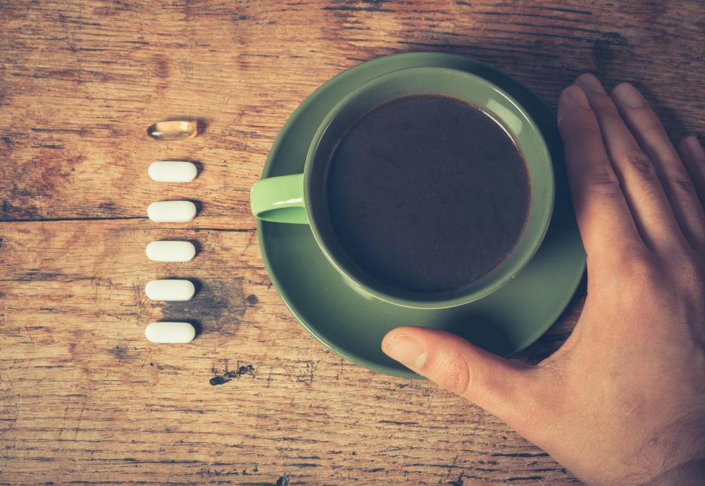 Caffeine quickens the heart rate, meaning aspirin is sent throughout a person's body more quickly.