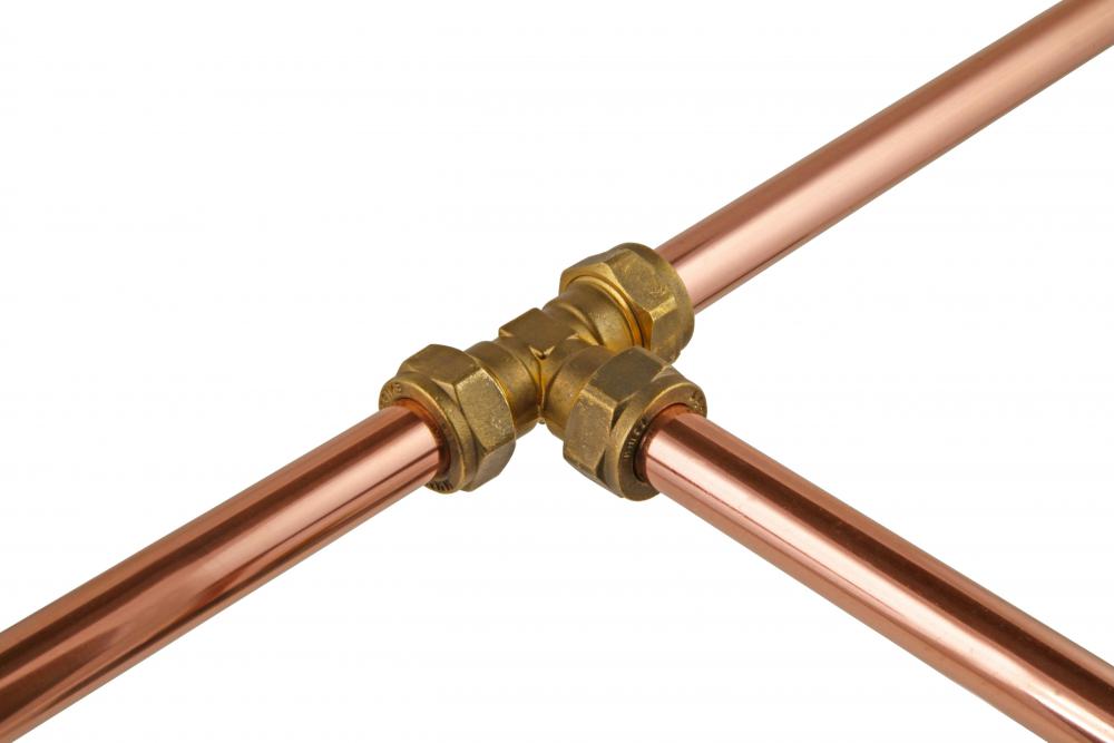 Copper pipes with a tee joint.