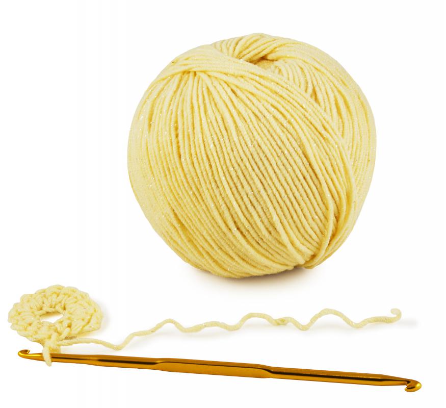 Crochet involves a hook pulling loops of yarn.