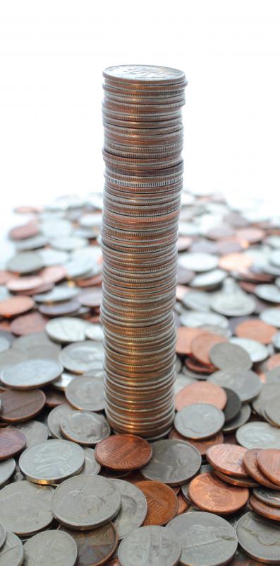 Stack of coins, including pennies.