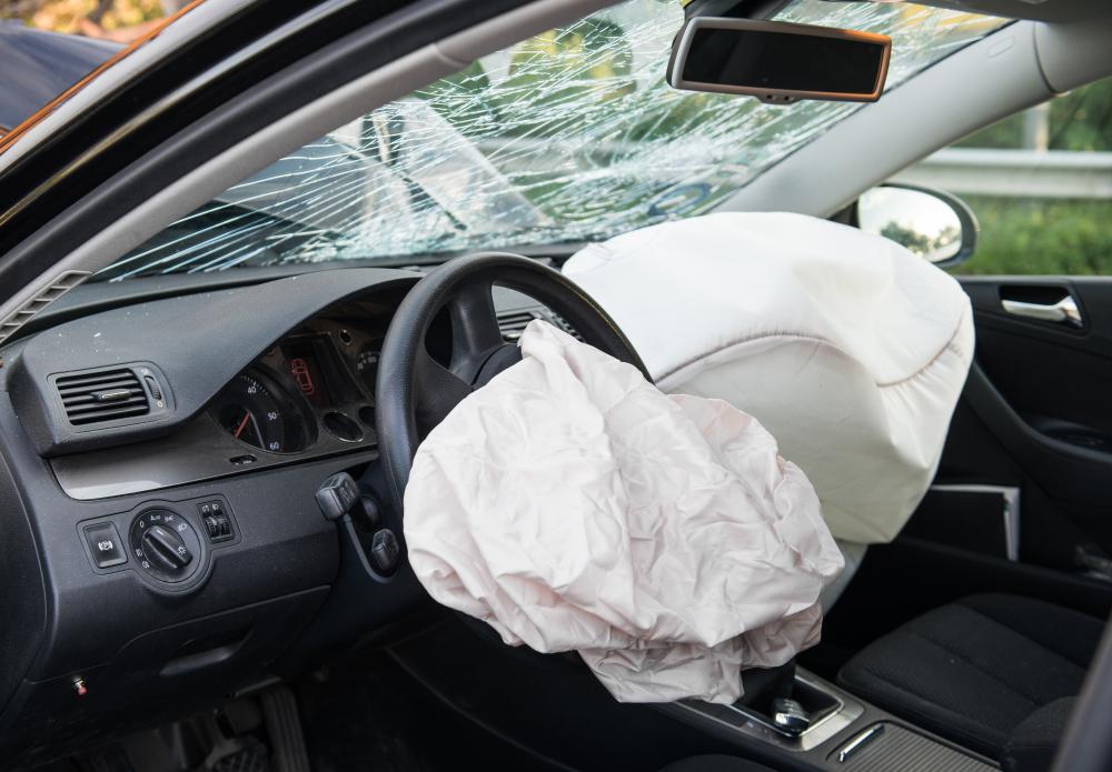 Inertia can propel a driver through a car's front window during a crash if airbags do not cushion their movement.