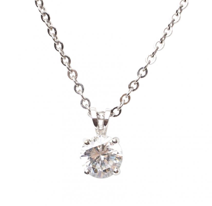 A solitaire diamond necklace may be worn with semi-formal attire.