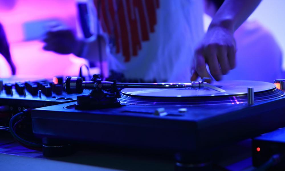 A DJ might be hired for a toga party.