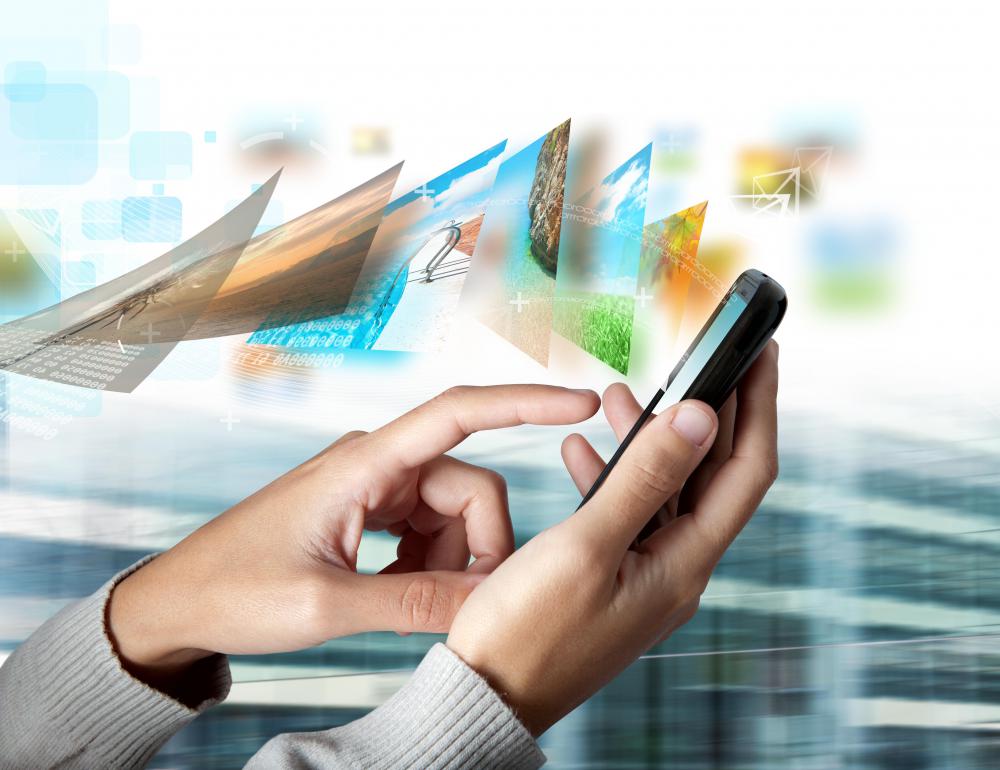 A mobile phone user downloading applications using 4g.