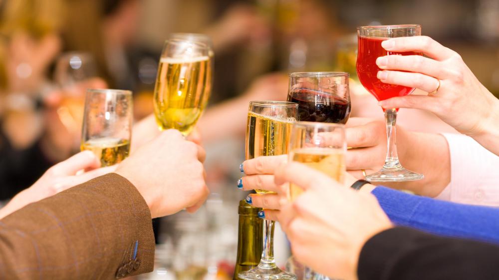 The most common use of "down the hatch" is when two or more people are preparing to drink alcohol at the same time.