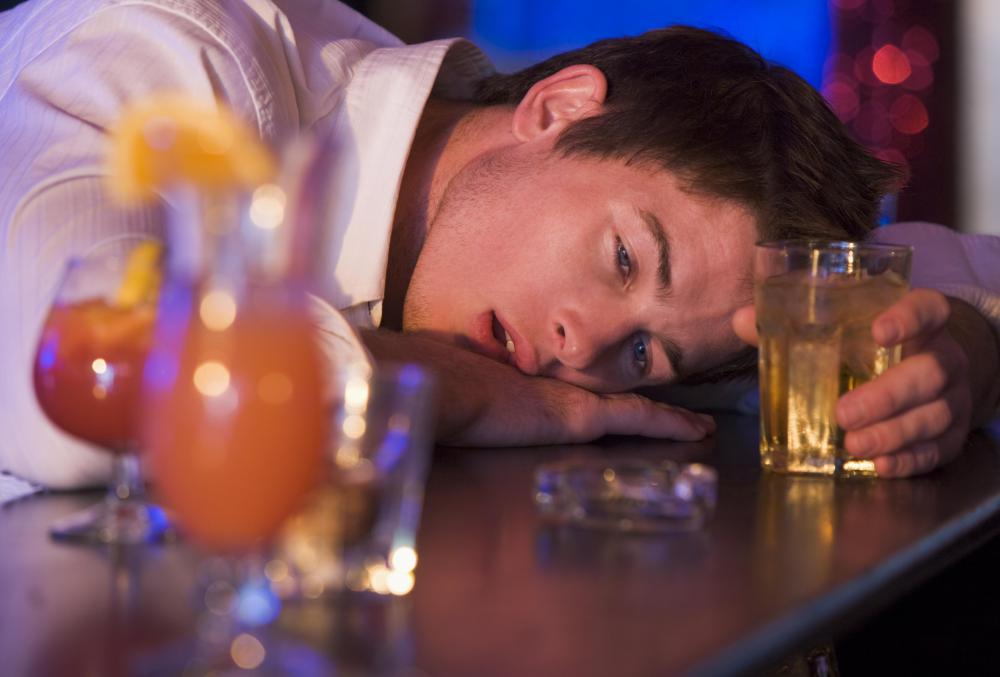 Alcohol in the brain can bind to GABA receptors and reduce neuron activity, which is why alcohol can act as a sedative.