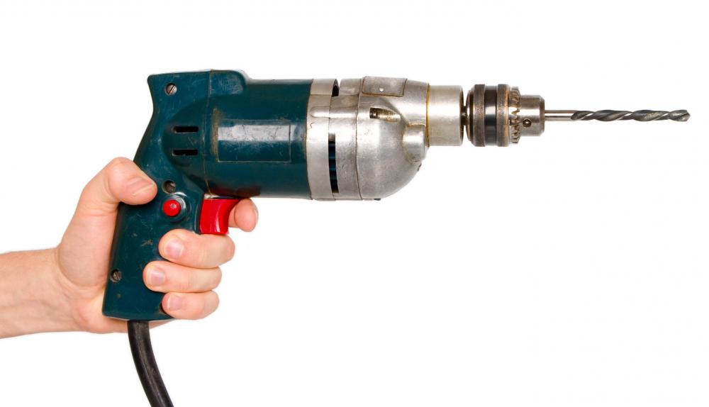 Electric drills may be used to push screws into wood surfaces.