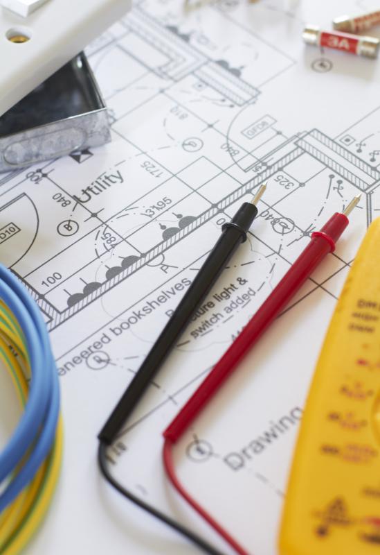 An electronic engineer create schematics for new products.