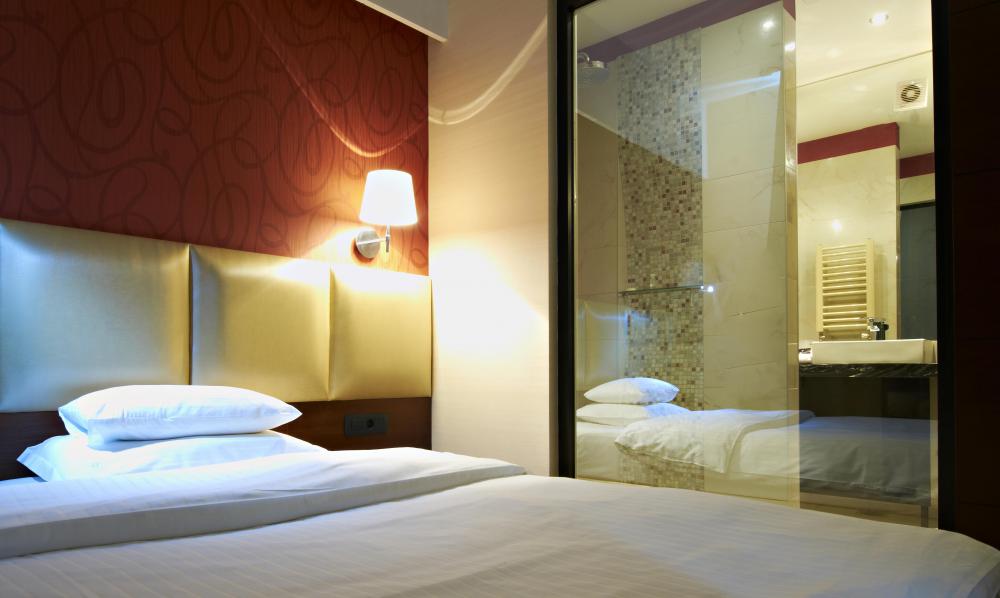 Travel agents fees might include costs of booking hotel rooms.