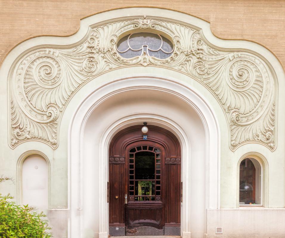 Curved lines and arches are characteristic of Art Nouveau architecture.
