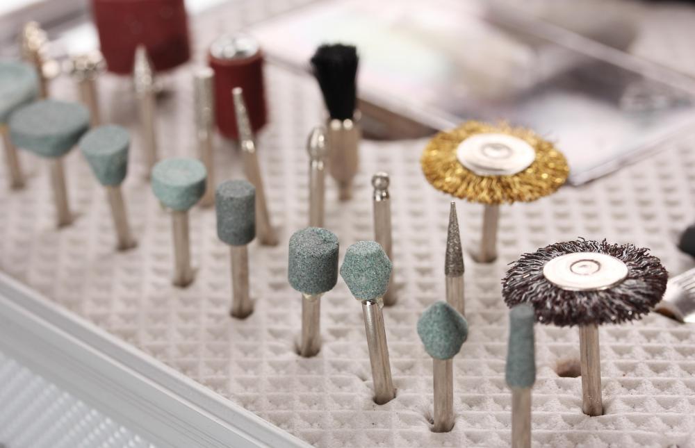 Steel needles are used to lay down a design during the etching process.