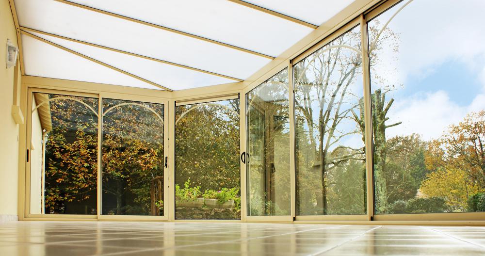 Polycarbonate windows are installed in sunrooms and favored for their durability.