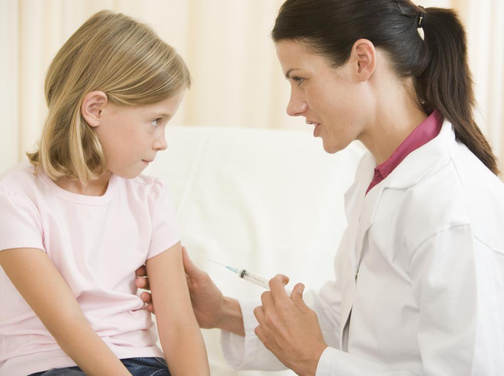 One type of government spending is providing free or discounted immunizations to children of low income families.