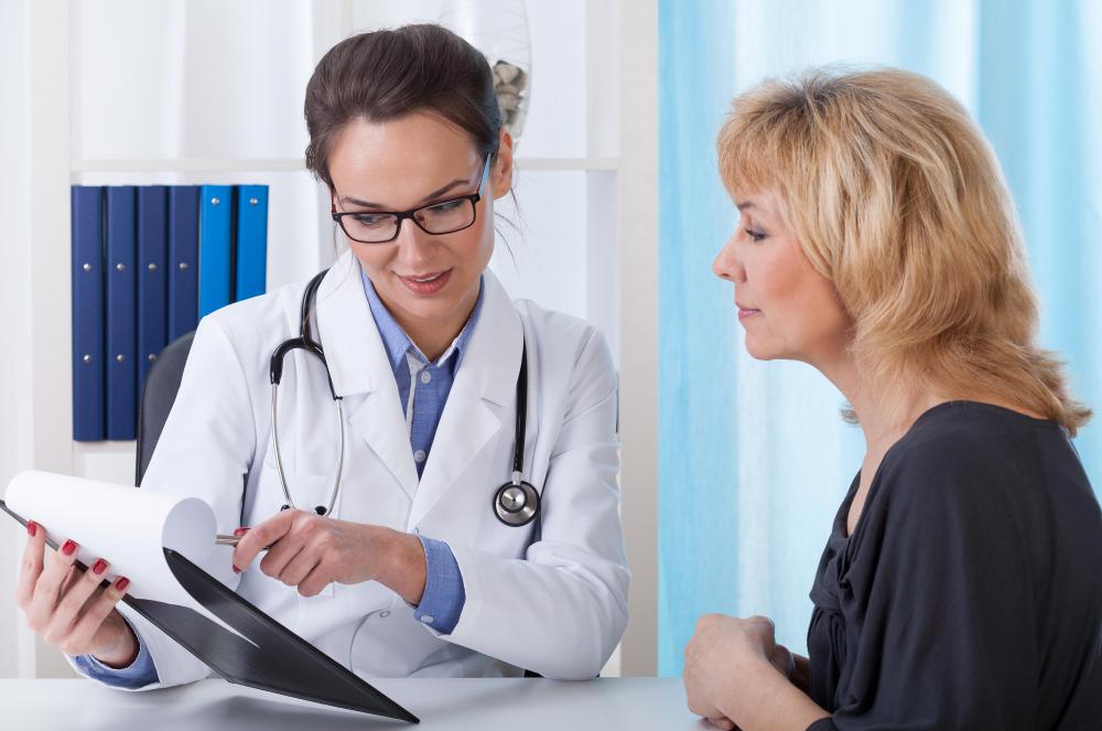 A doctor should be consulted if there is bleeding or redness associated with the area surrounding an ear gauge.